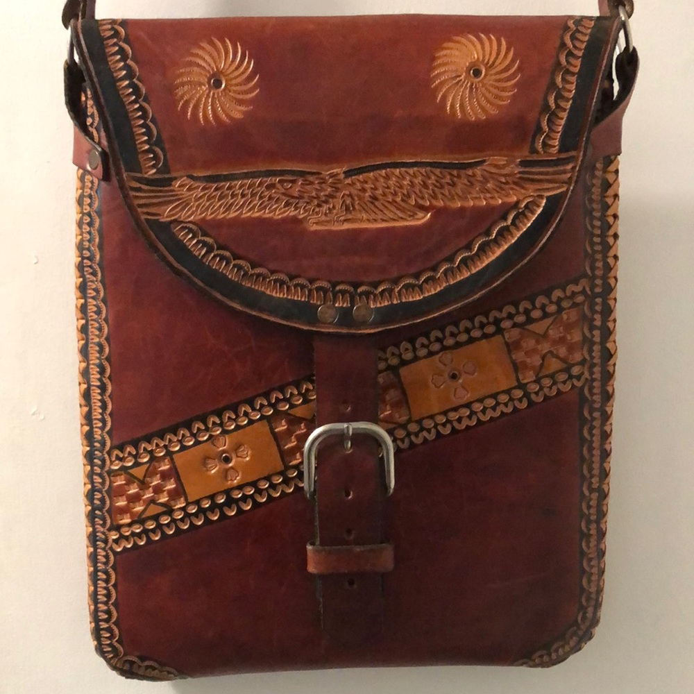 Unisex leather embossed messenger style bag
